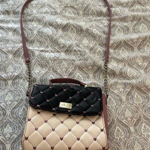 Elegant Quilted Black and Cream Handbag